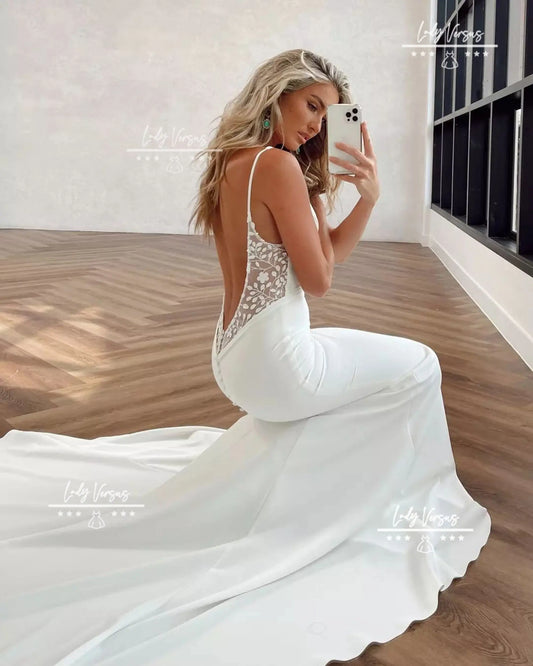 Classy Elegant Wedding dress, Low back bridal gown, Beach wedding dress, French Crepe skirt and a stunning floral 3D lace detail.